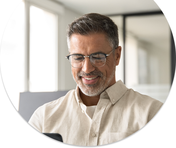 Business person on phone takes advantage of Banesco USA's digital tools