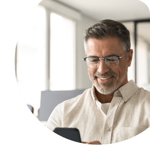 Business person on phone takes advantage of Banesco USA's digital tools