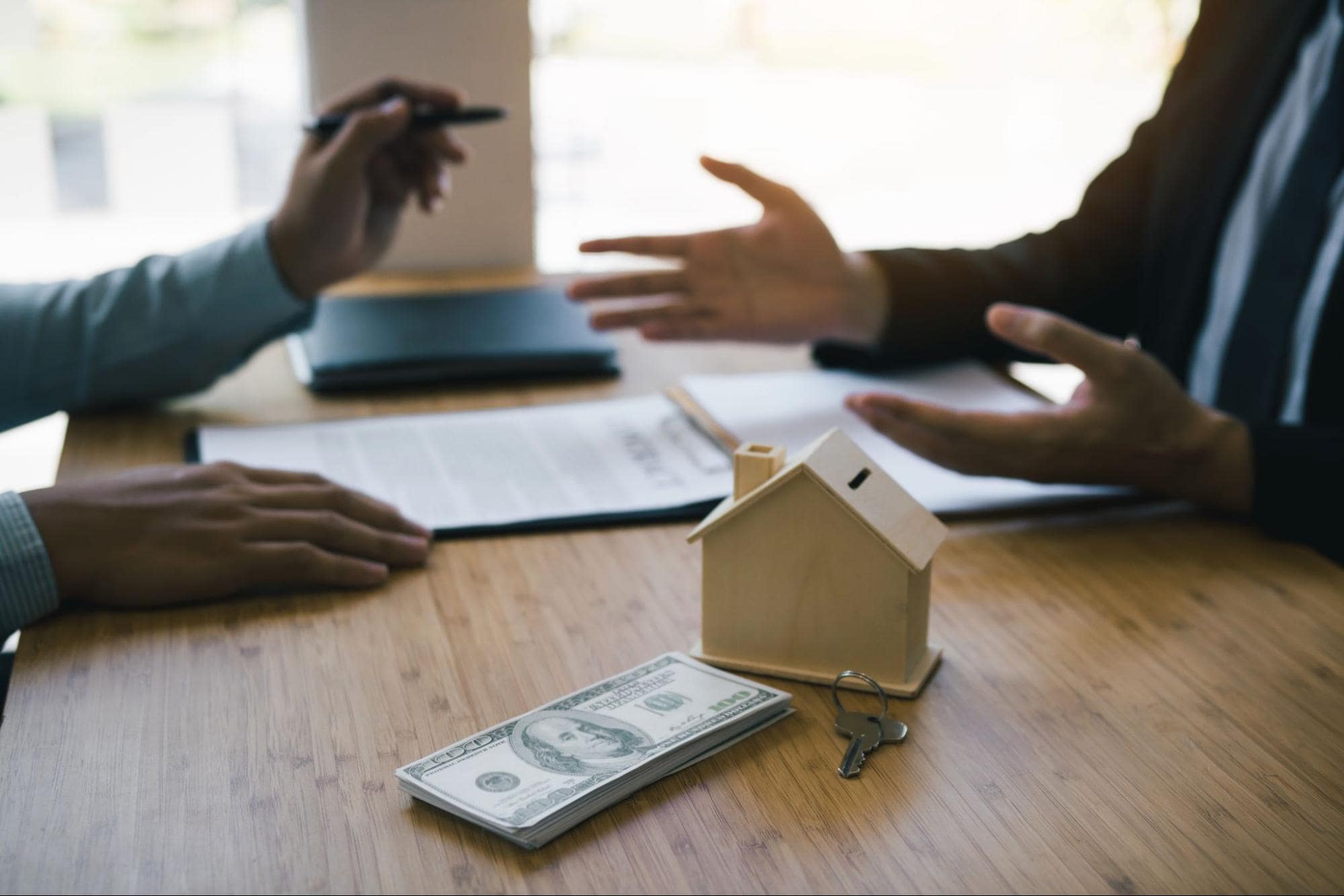 Flexible home financing - people discussing business deals for home loans