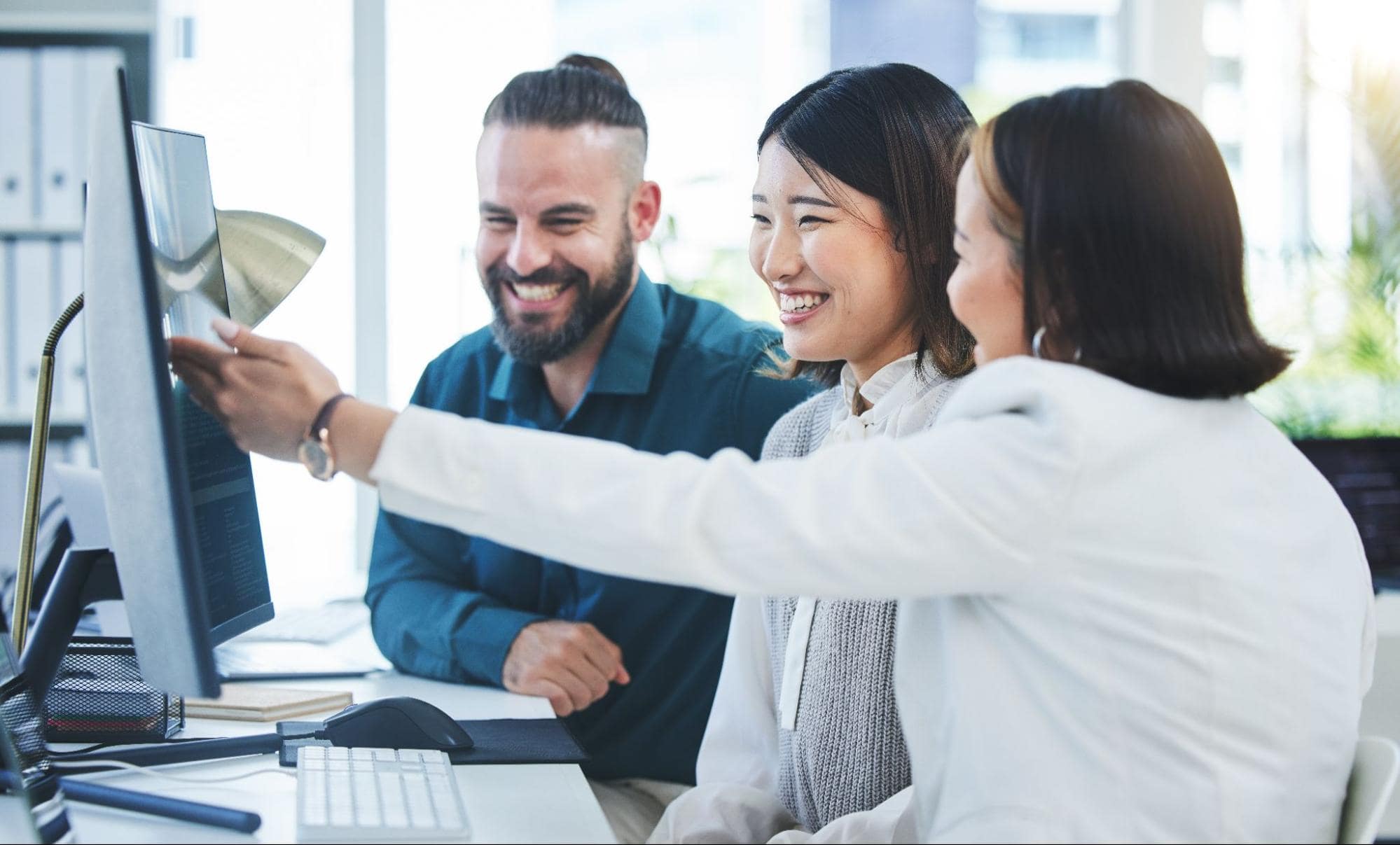 multiethnic group of professionals looking up small business loans florida requirements online