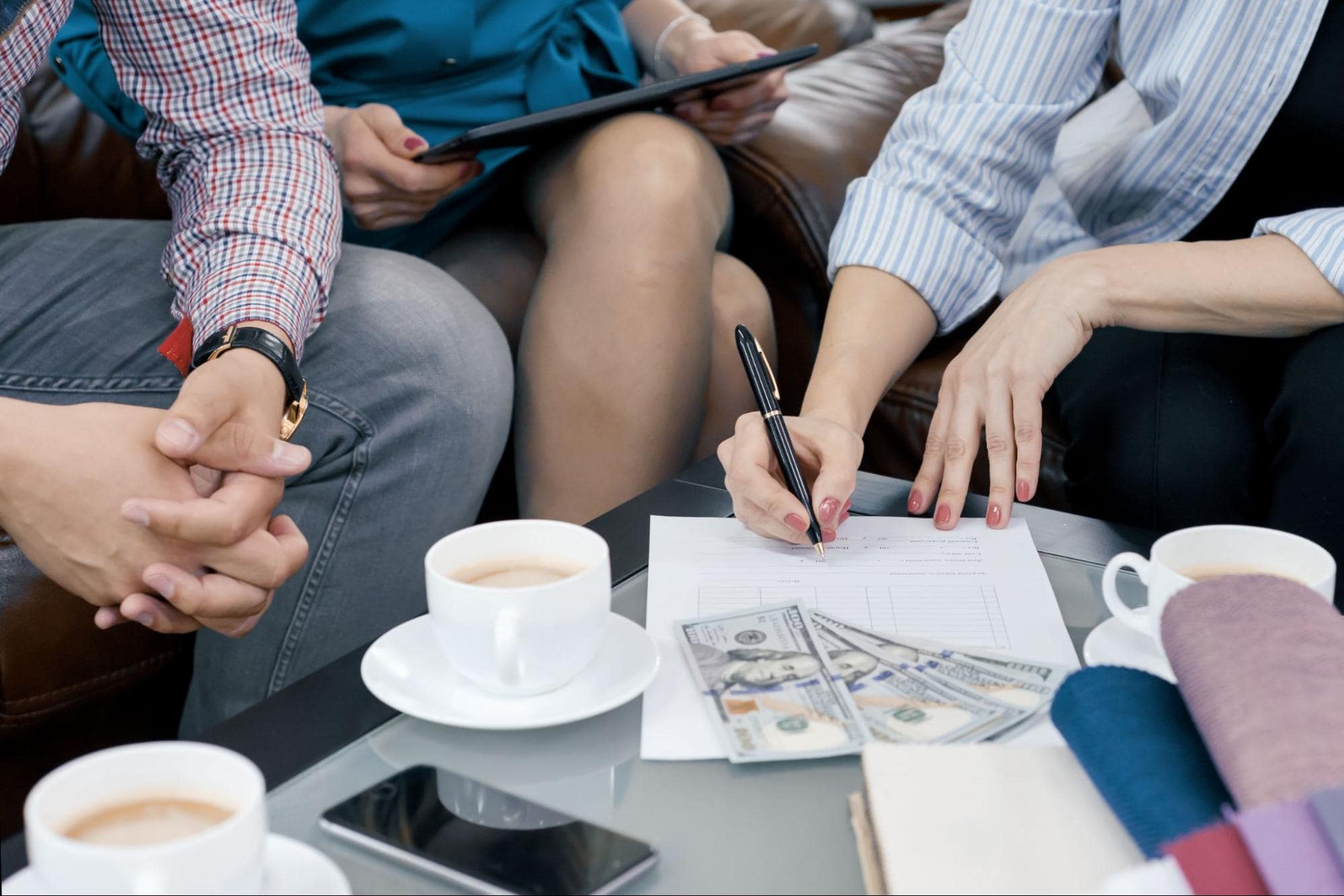 professionals signing a small business loan
