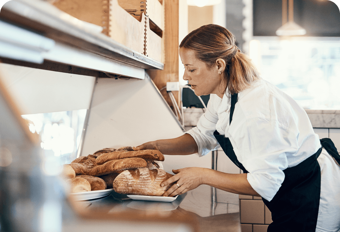 Baker working with bread